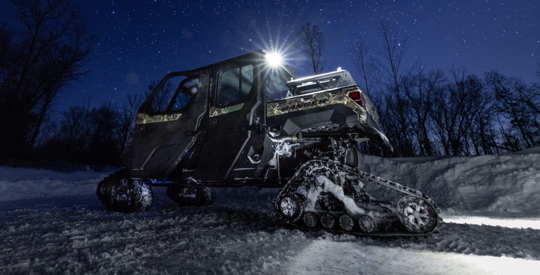 Tracked UTV at night